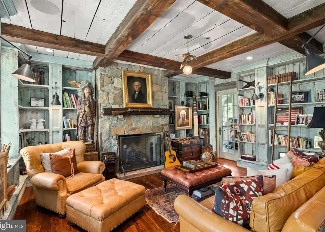 Cozy rustic living room with fireplace.